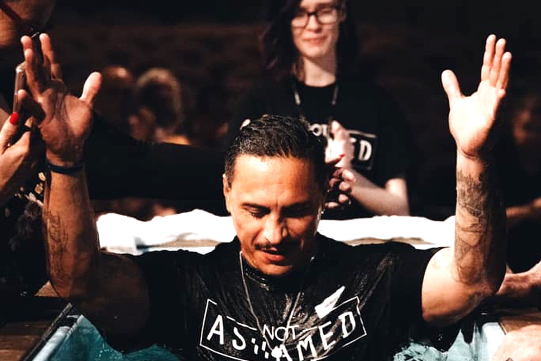 A person being baptized at Pure Heart Church